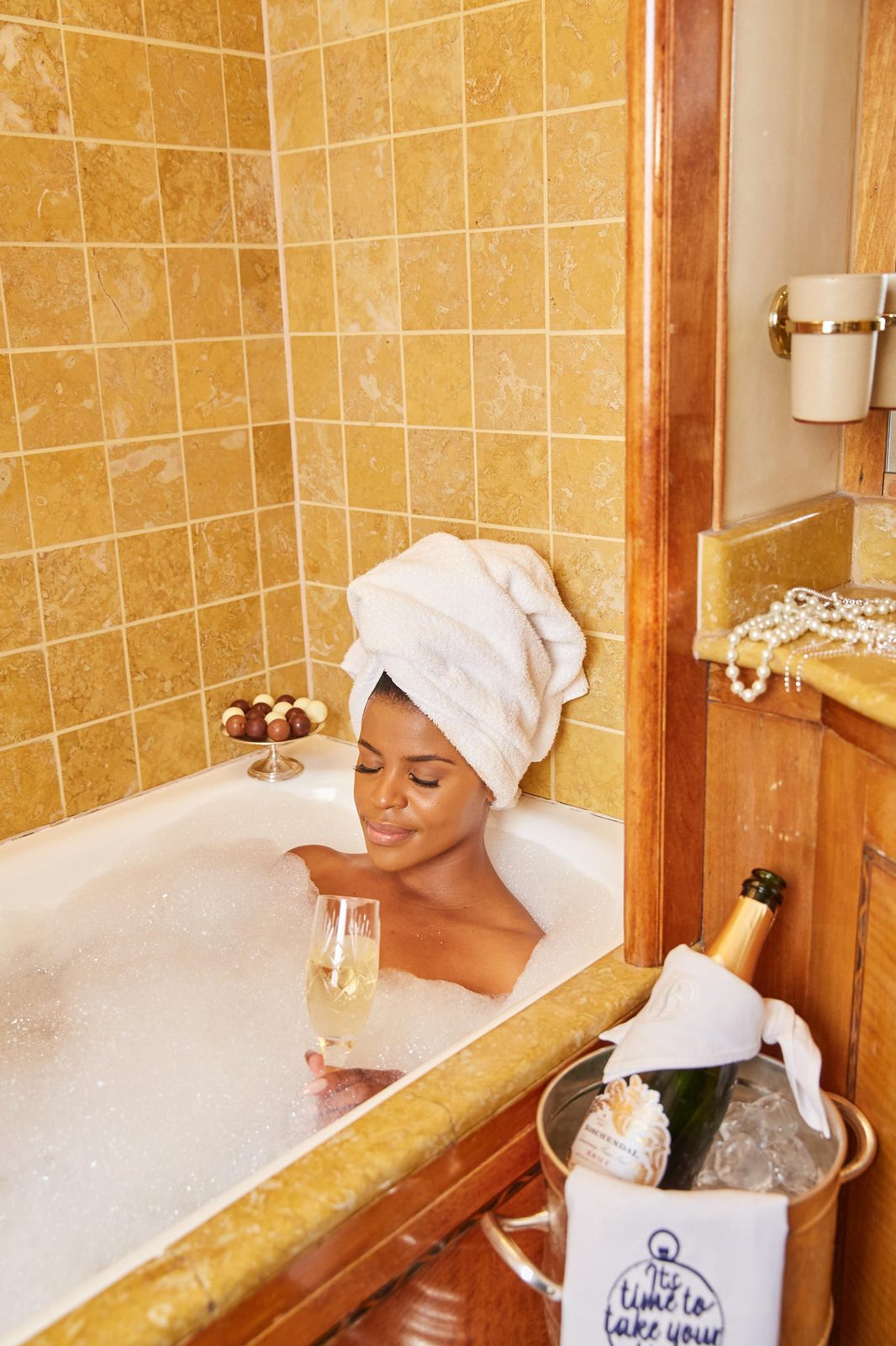Sparkling wine in a suite bath