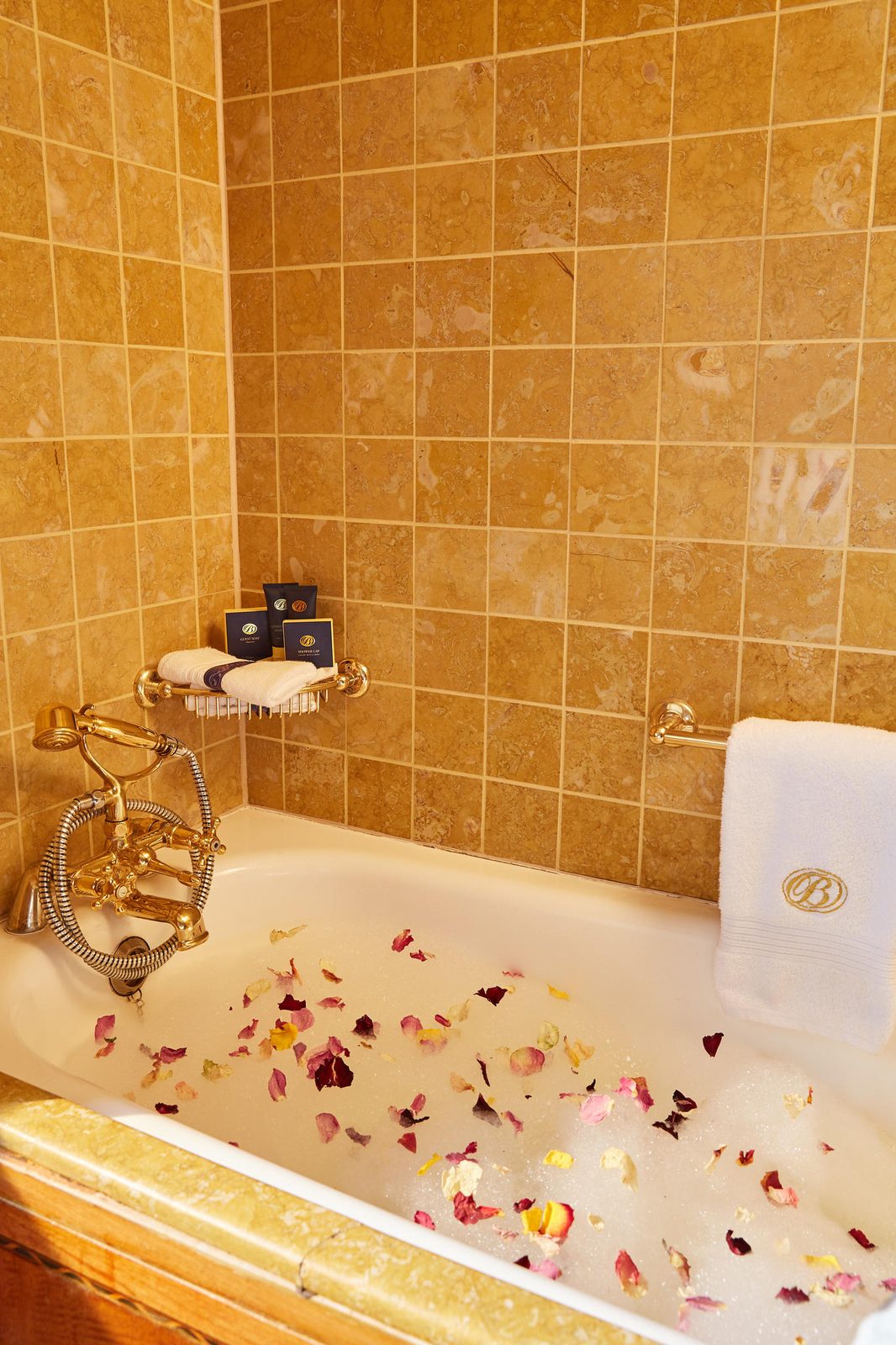A luxury bath drawn with rose petals