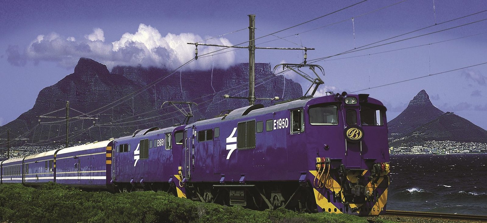 The Blue Train against a Table Mountain backdrop