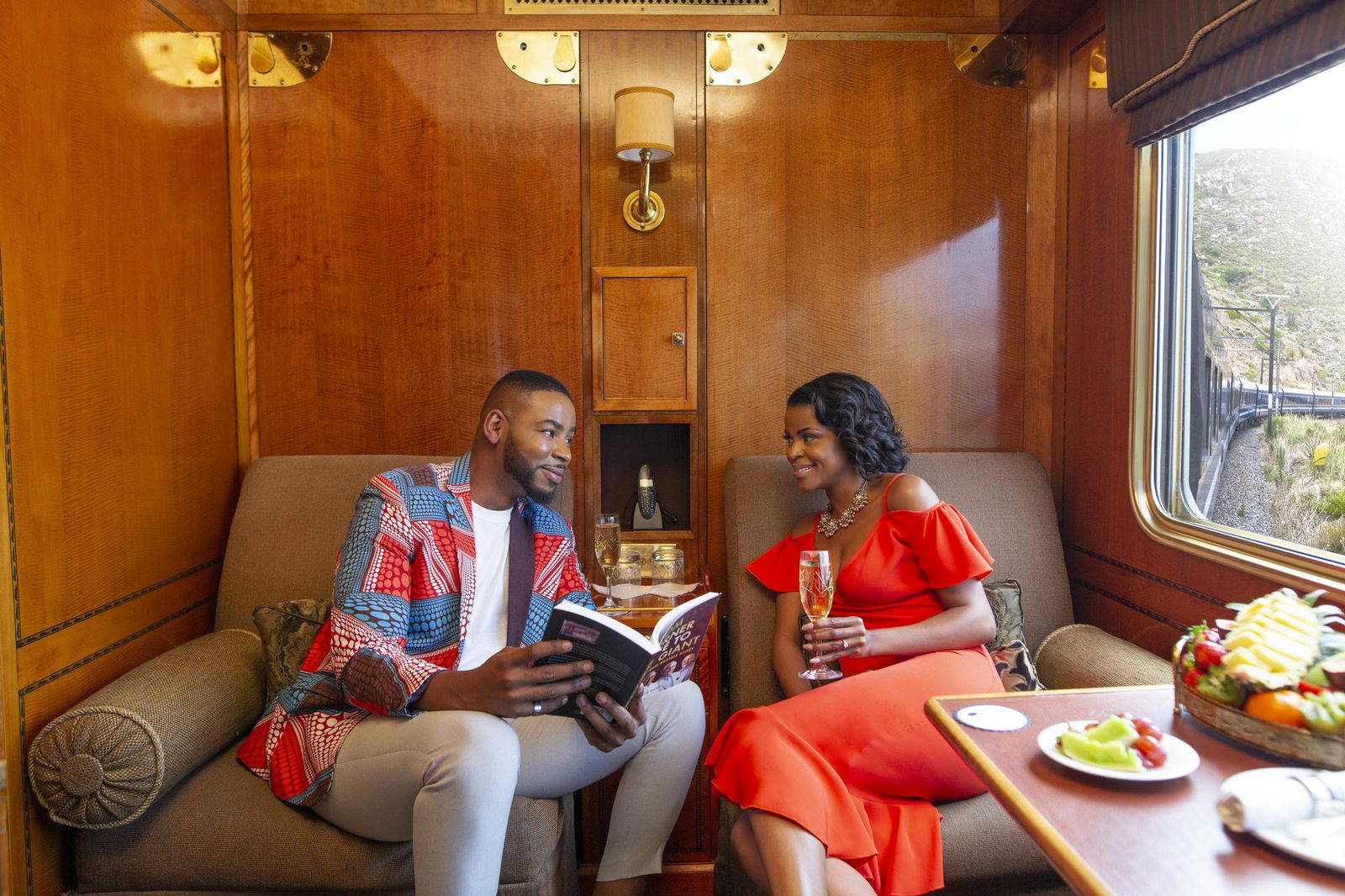 Guests relaxing in a Blue Train suite