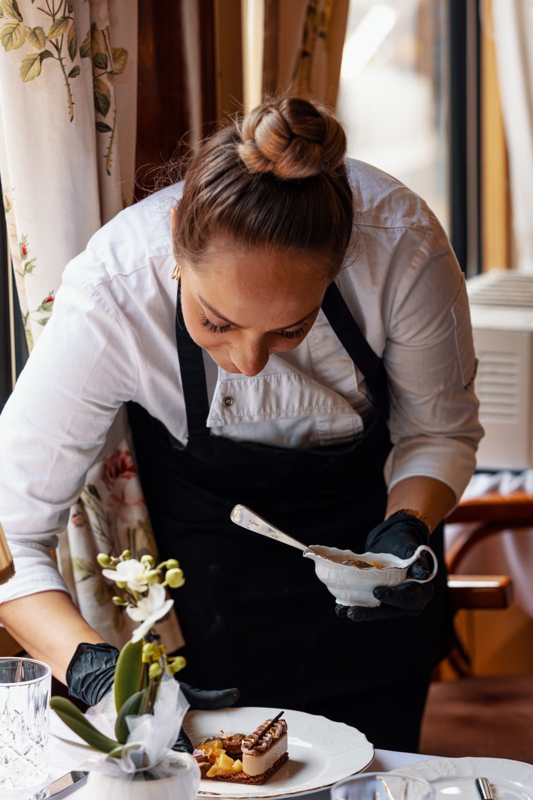 Dining service aboard the Golden Eagle Danube Express